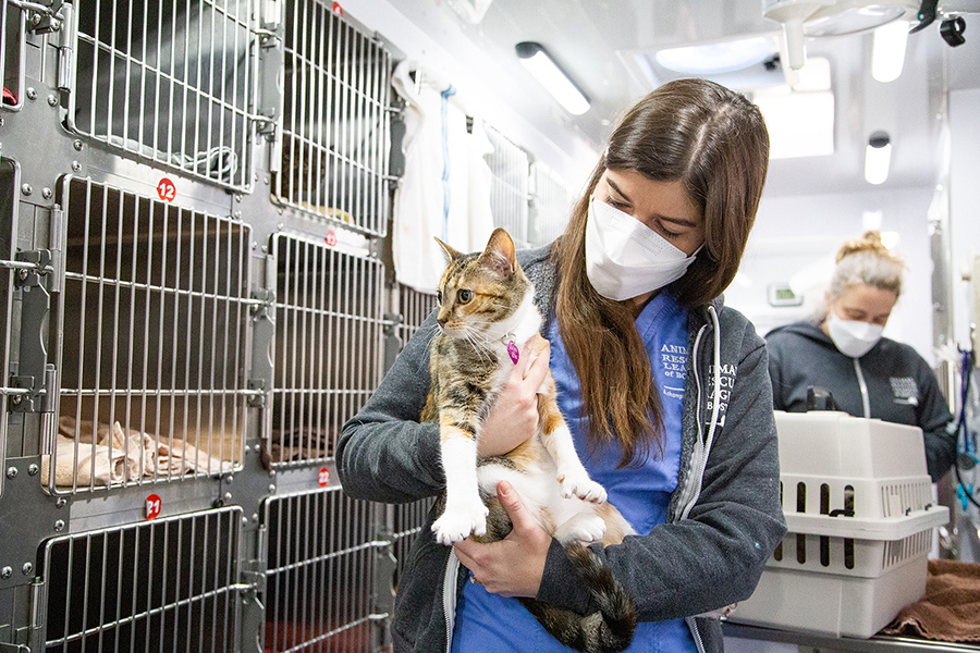 Dr. Hannah Donnelly holding a Spay Waggin&#039; client