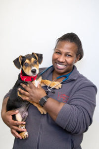 Dr. Clarissa Williams holding a puppy