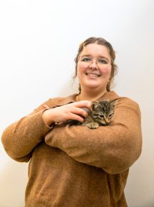Evelyn Cameron holding a kitten