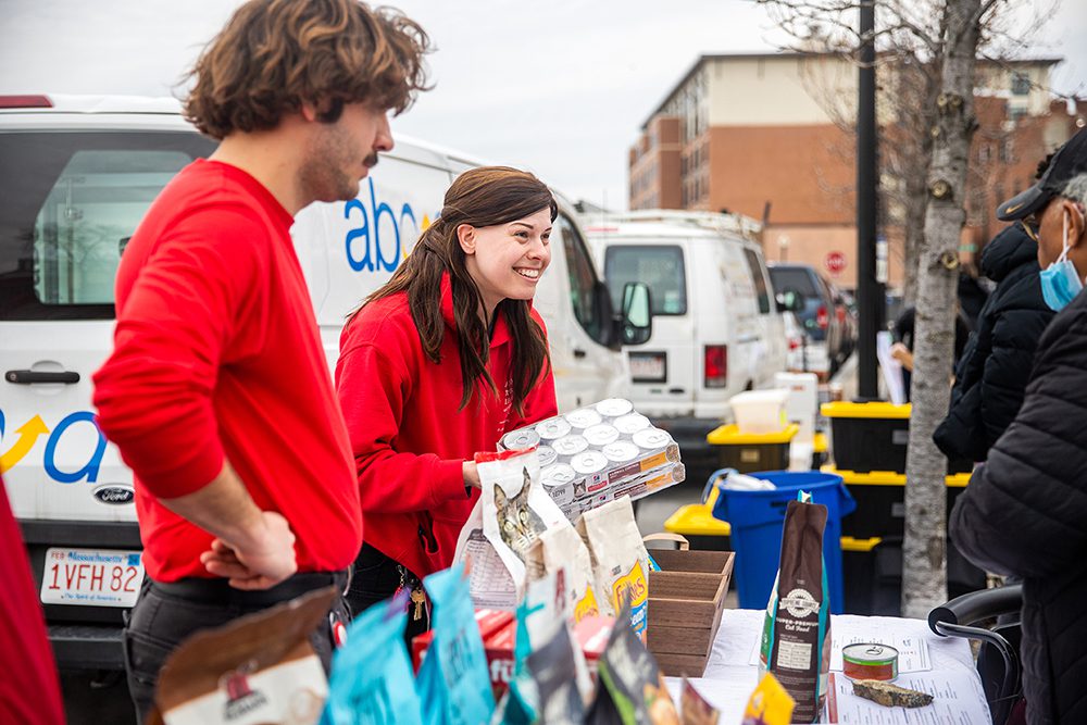 ARL staff members work to hand out pet food at ABCD pop-ups